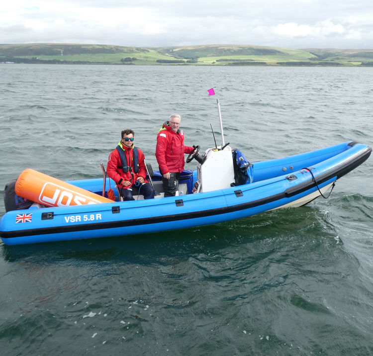 Powerboat racing through the water