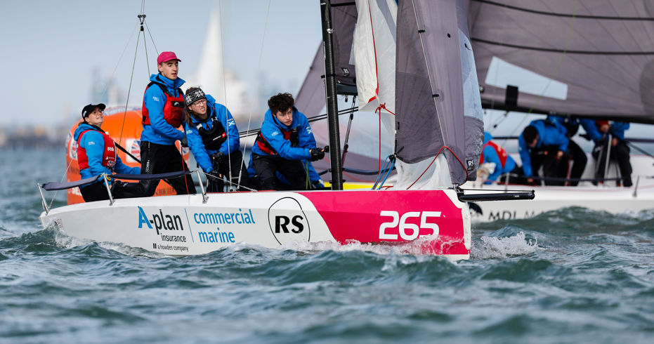 Long shot of crew onboard a keelboat