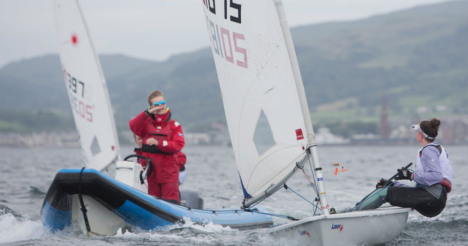 dinghies sailing through a race